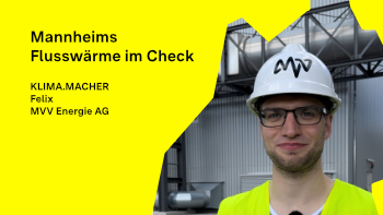 Porträt von Felix Hack, der einen Helm und eine Warnweste trägt.