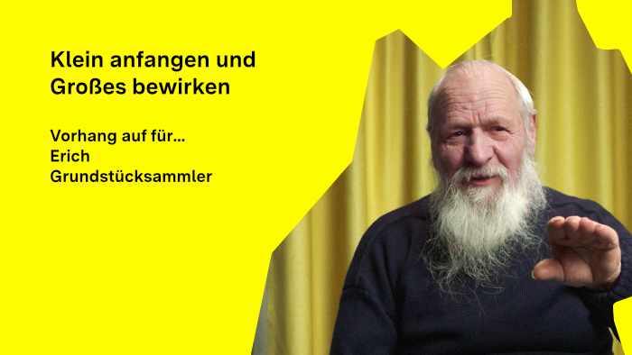 Erich Roth schaut in die Kamera, im Hintergrund ist ein Vorhang zu sehen.